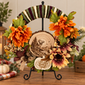 Rustic fall deer wreath displayed on a stand