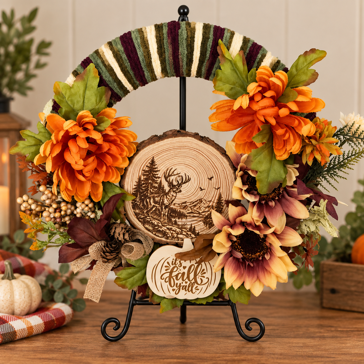 Rustic fall deer wreath displayed on a stand